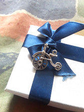 SILVER CHARM PENNY FARTHING